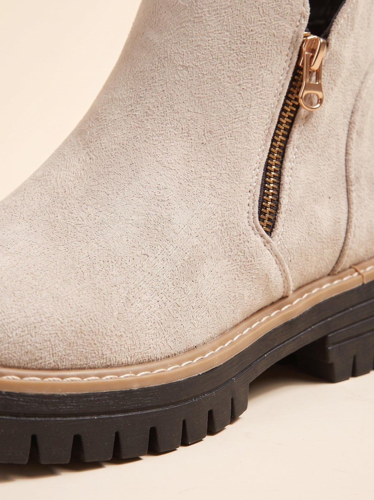 Women's Ankle Boots – Beige – side zip and lug sole close-up
