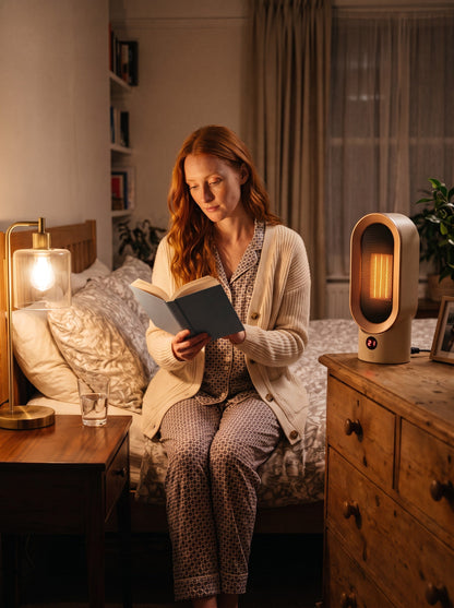 Electric Fan Heater 800 W – Cream/Gold – in a bedroom at night