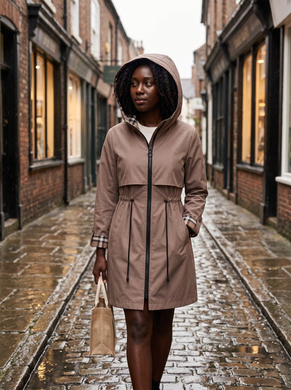 Women's Hooded Raincoat – Brown – lifestyle in the rain, hood up