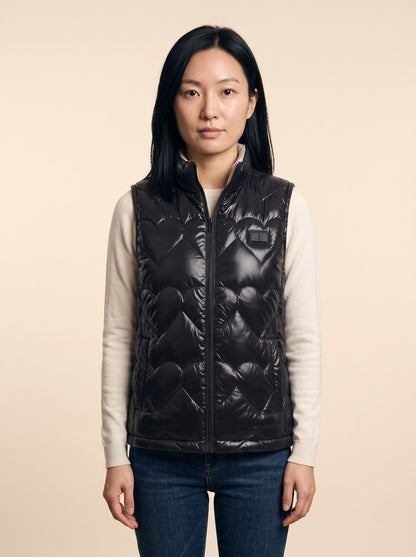 Women's Heated Glossy Puffer Gilet – Black – on model