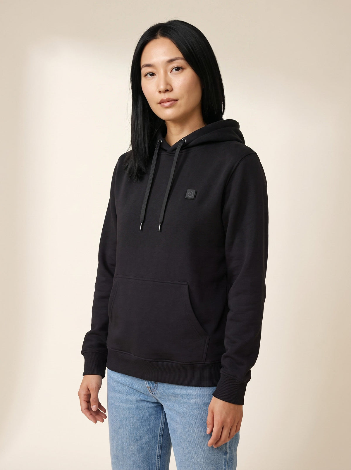 Heated Hoodie Unisex – Black – front, on model