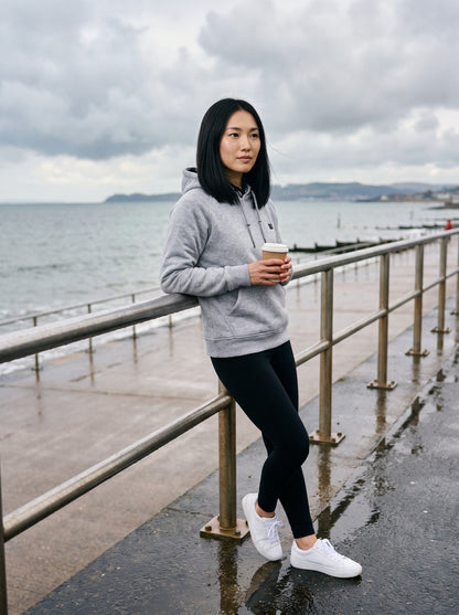 Heated Hoodie Unisex – Grey – worn by the sea
